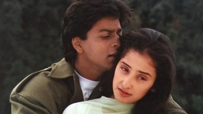 Manisha Koirala and Shah Rukh Khan hugging in "Dil Se" movie