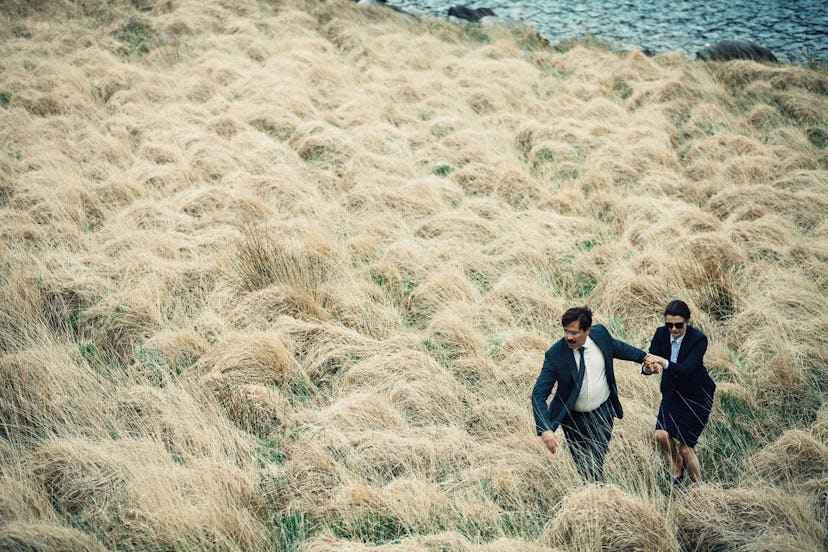 "The Lobster" movie scene of a couple running down a grass field