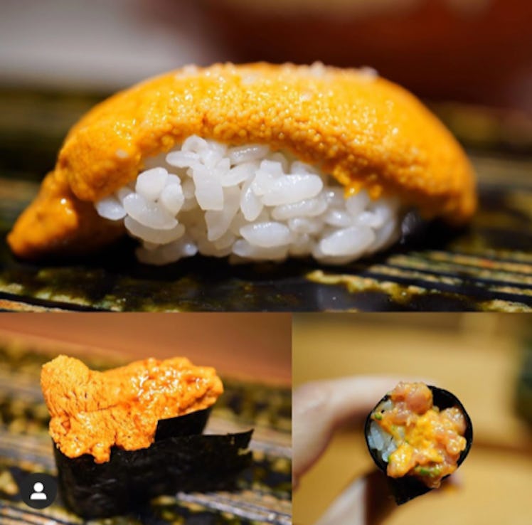 A piece of sushi has orange sauce on it at a restaurant in Mexico City.