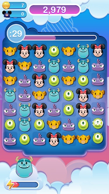 Emoji versions of Disney characters are arranged in a puzzle on Disney Emoji Blitz.