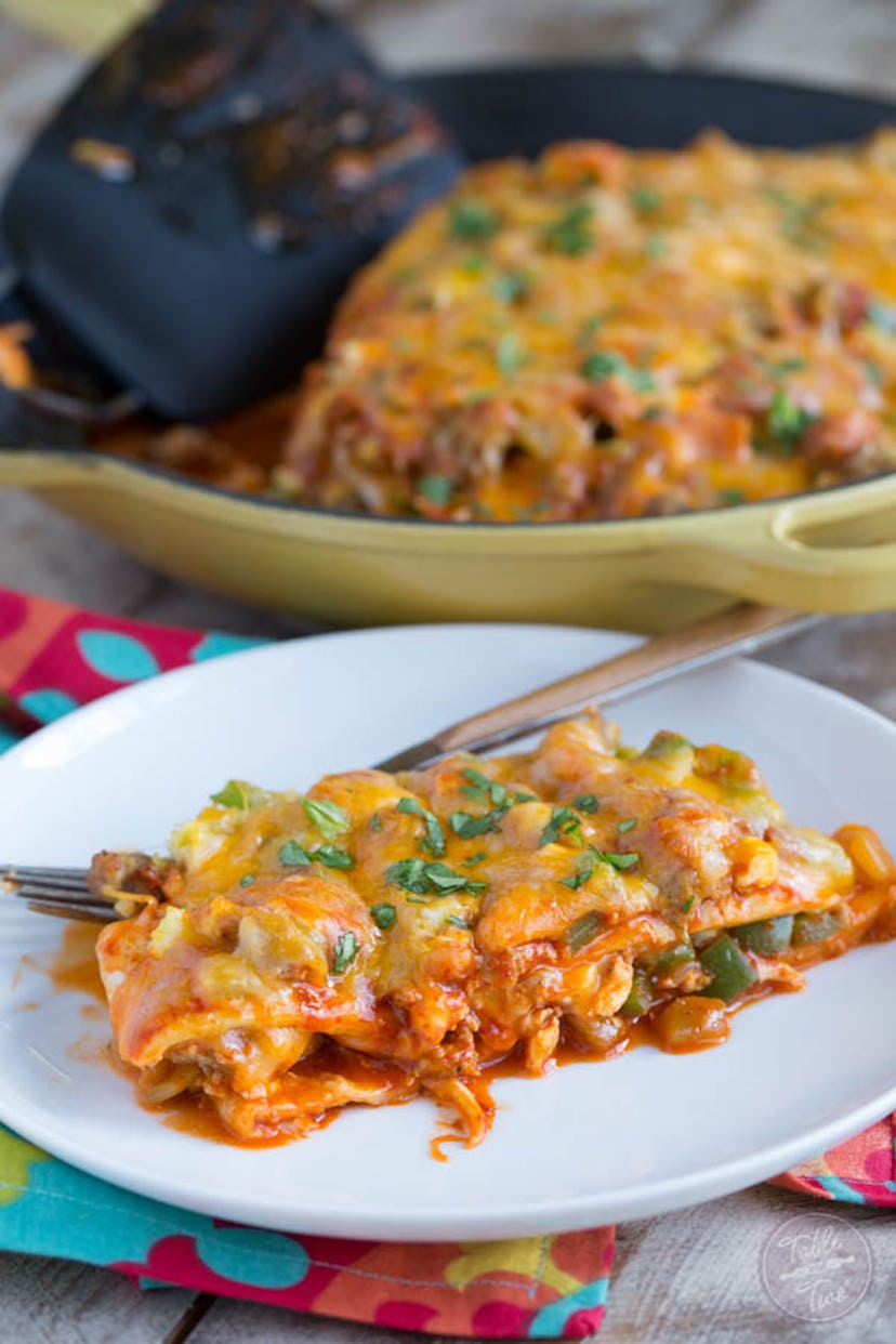 A meal of eggy breakfast enchiladas.