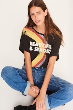 Model wearing Beautiful & Strong T-shirt by Ba&sh created to celebrate International Women's Day.