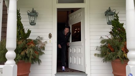Jimmy Fallon peeks out his front door while social distancing during the coronavirus pandemic. 