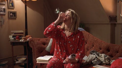 A screenshot from the film Bridget Jones' Diary where Bridget is in her pajamas drinking wine. If yo...