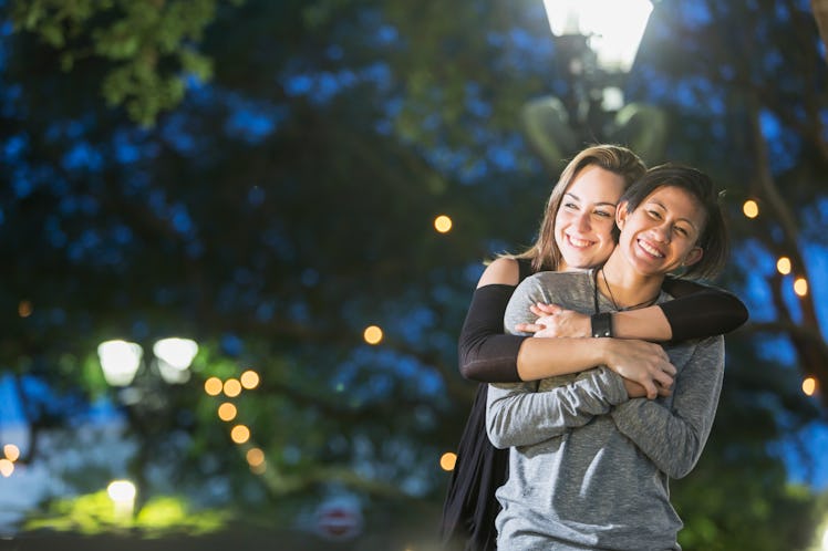Lesbian couple at night