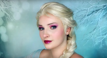 A woman wearing Elsa-inspired makeup from Disney's 'Frozen' has her hair braided like Elsa's.