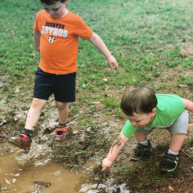 Playing in the mud is one way kids are entertaining themselves during social distancing. 