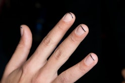 Minimalist nail art ideas, like this black line manicure, are so easy to DIY at home