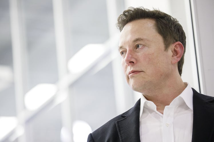 Elon Musk in a formal suit