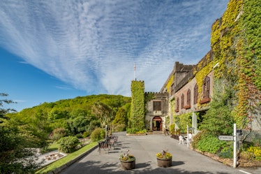 Abbeyglen Castle in Ireland features a quaint and cozy atmosphere, and is surrounded by lots of gree...