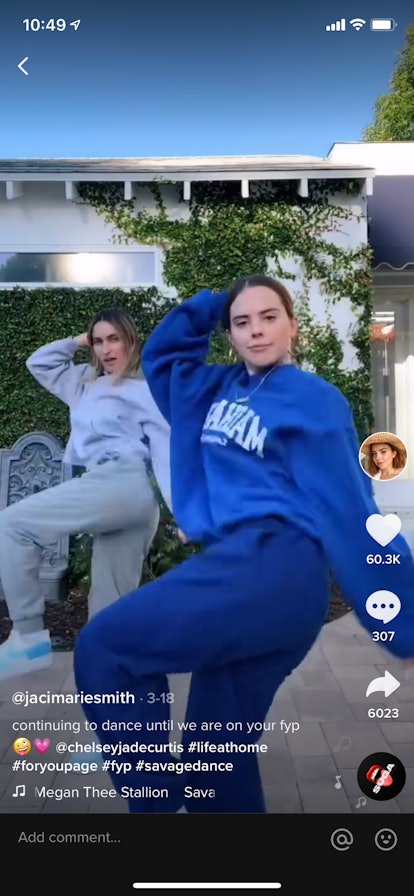 Jaci Marie Smith and Chelsey Jade Curtis do the #savagedance on TikTok in a driveway.