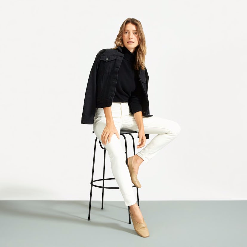 A model posing in The High-Rise Skinny Jean for Everlane's 25% Off Sale 