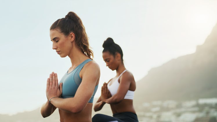 Two women meditating