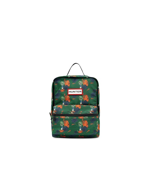 A delightful green backpack with Peter Rabbit print. 
