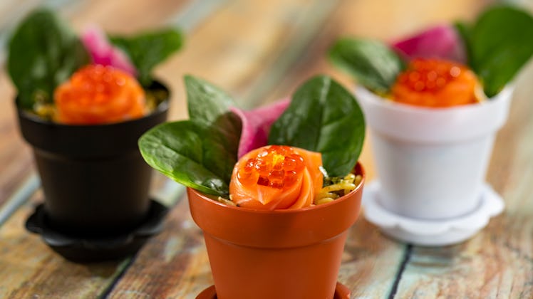 Salmon rolled up and placed in a pots, so it looks like flowers is being served at the 2020 Epcot In...