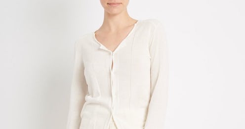 A white button-up cardigan from Inhabit