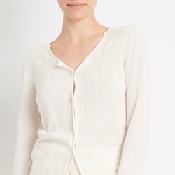 A white button-up cardigan from Inhabit