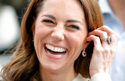 Kate Middleton wearing her engagement ring and smiling