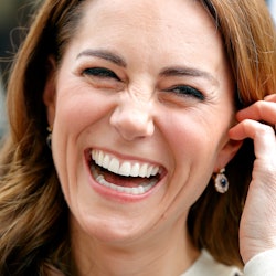 Kate Middleton wearing her engagement ring and smiling