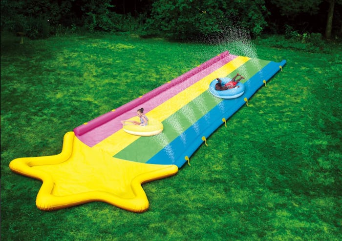 A ginormous rainbow super slide in your back yard can provide hours of fun in the sun.