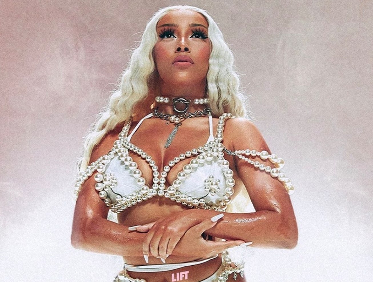 Doja Cat rocks an all-white makeup look provided by makeup artist David Velasquez