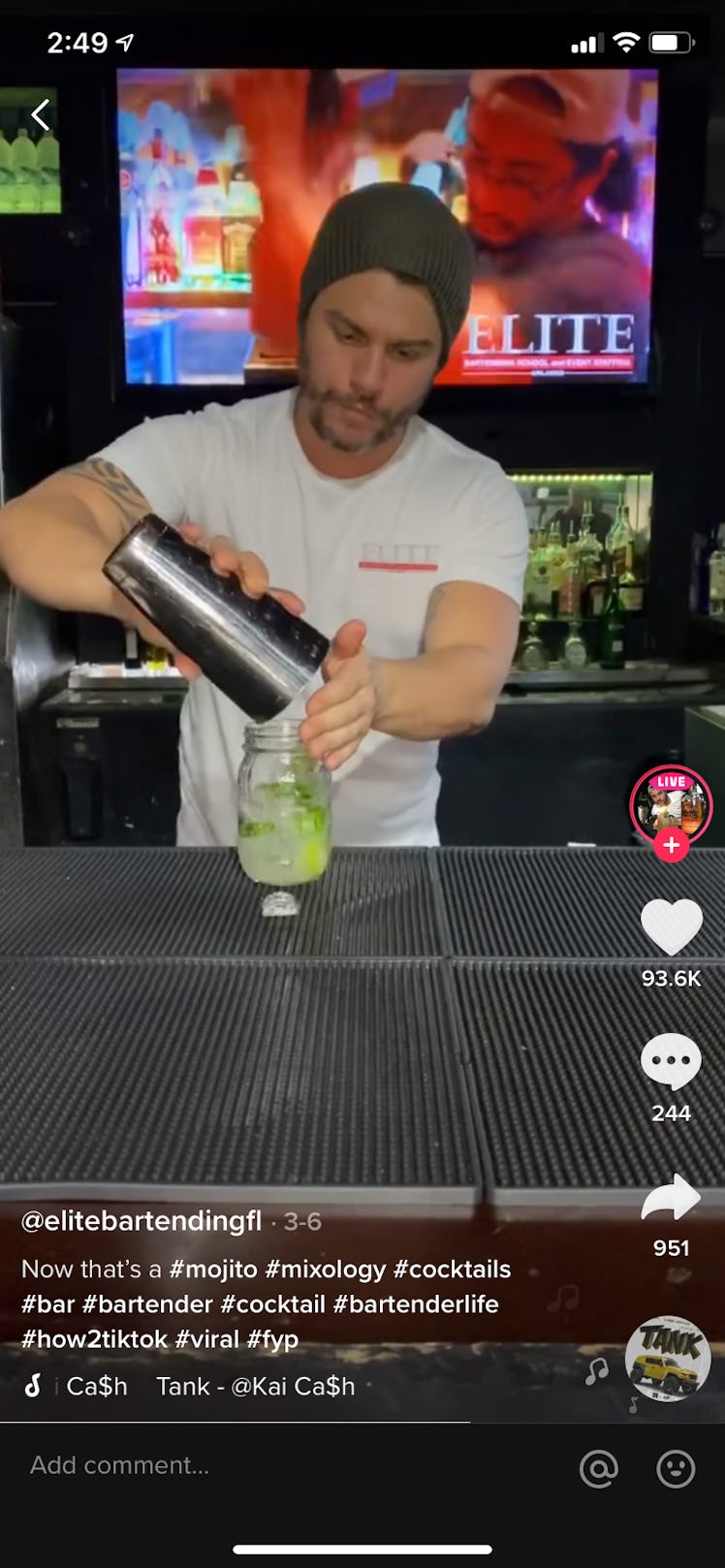 A young bartender brews a fresh mojito in a bar for TikTok.