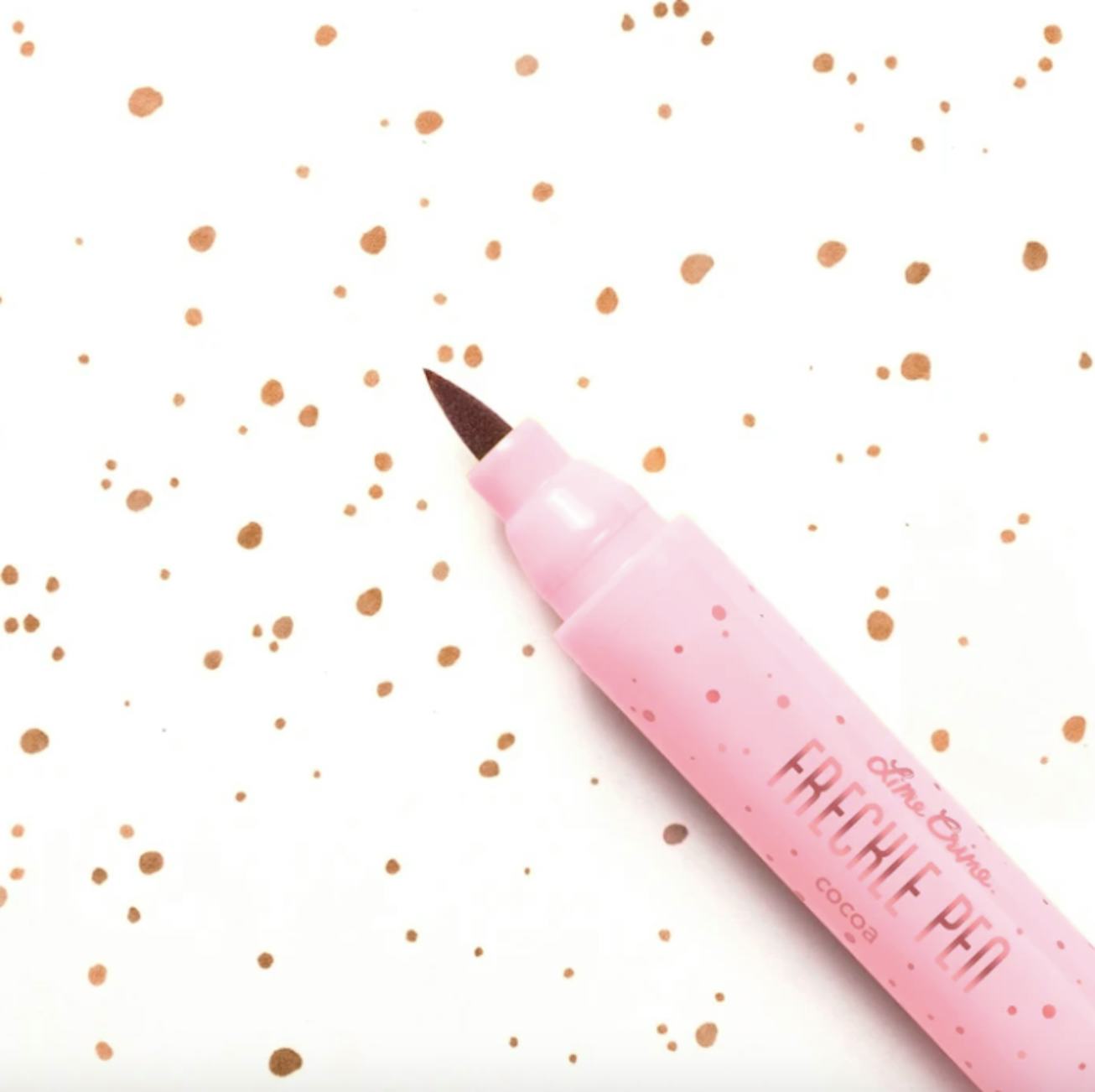 A smattering of dots created by LimeCrime Makeup's Freckle Pen.