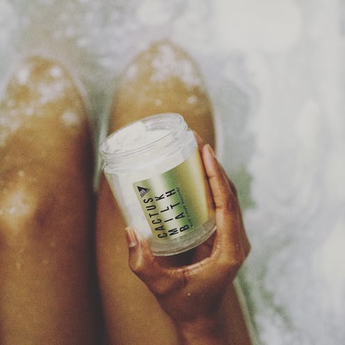 Shampoo bars and bath soaks packaged in pretty glass jars makes zero-waste bathing easy