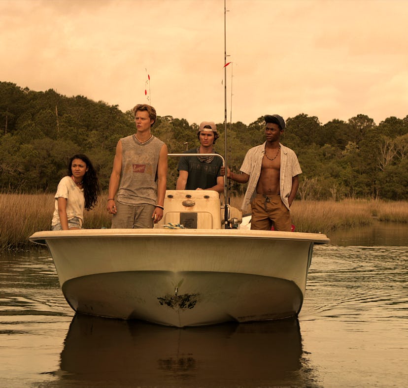 The cast of 'Outer Banks' on Netflix rides a boat
