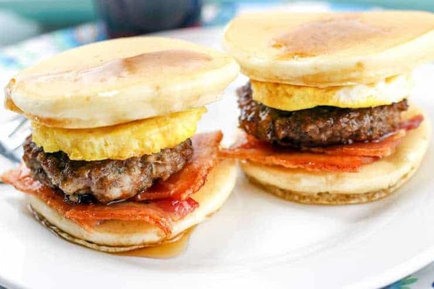 Close up of pancake sliders with bacon, egg, and sausage 