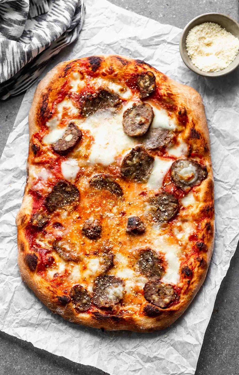 This meatball pizza can use frozen meatballs easily.
