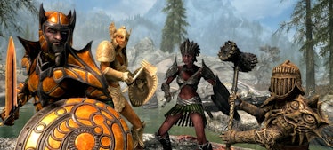 Four characters of different classes from elder scrolls standing beside each other ready for combat