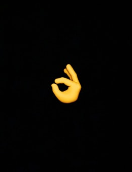 This emoji is meant to represent the word, "OK." 
