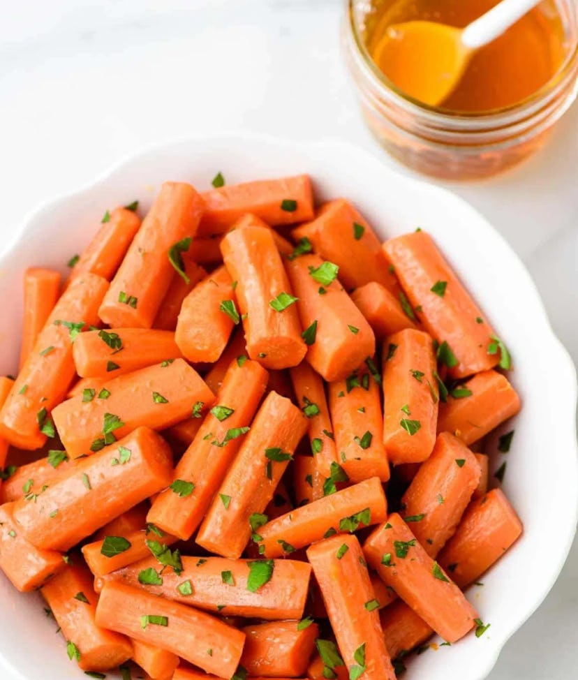 Well Plated's recipe for Crock Pot honey carrots is a sweet and kid-friendly way to serve veggies