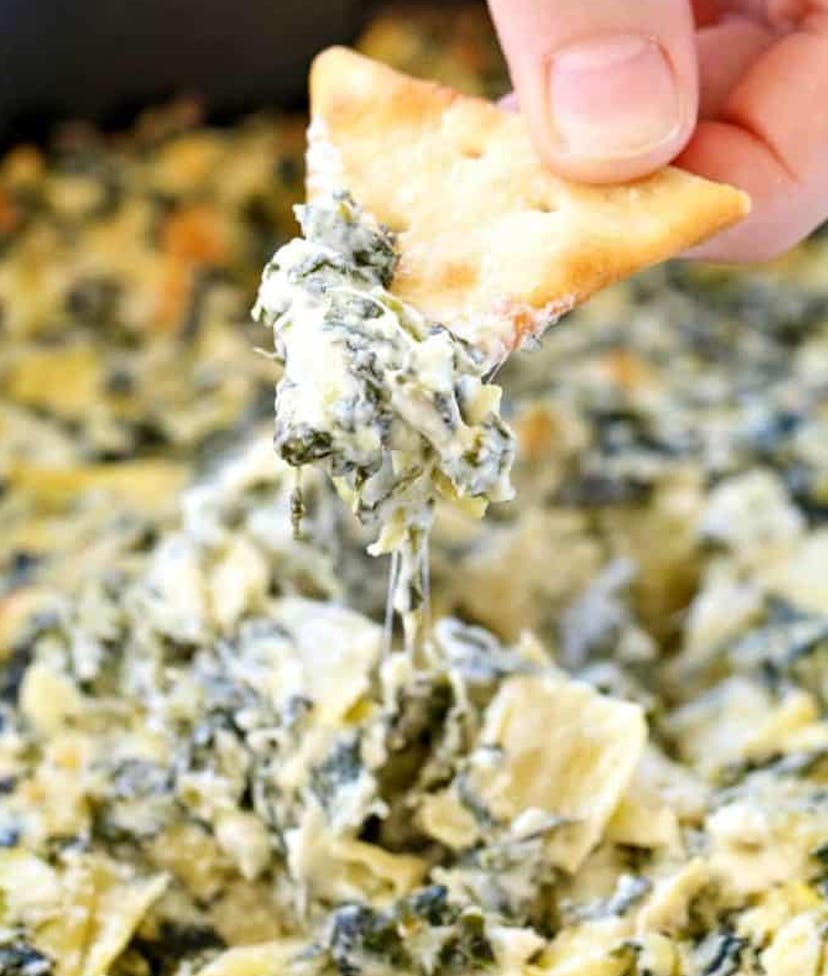Spinach and artichoke dip recipe from Princess Pinky Girl is made in the crock pot and perfect for h...