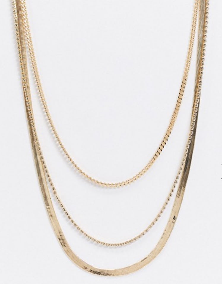 ASOS DESIGN Multirow Necklace with Flat Snake and Curb Chains in Gold Tone