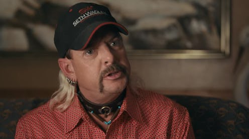 Tiger King wearing a cap with six earrings on his right ear