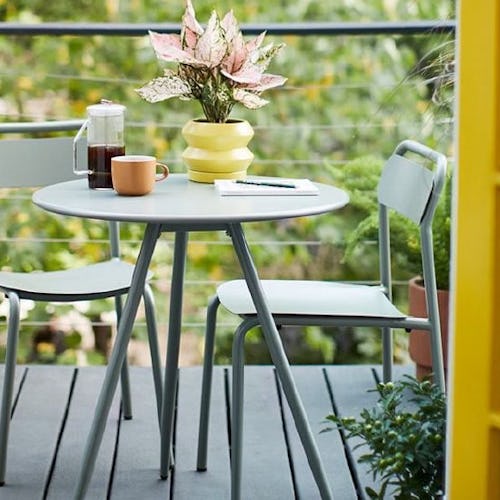 The small outdoor space turned into a respite by easy patio upgrades.