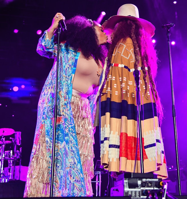 Jill Scott (L) and Erykah Badu perform with The Roots during the 2018 Essence Music Festival at the ...