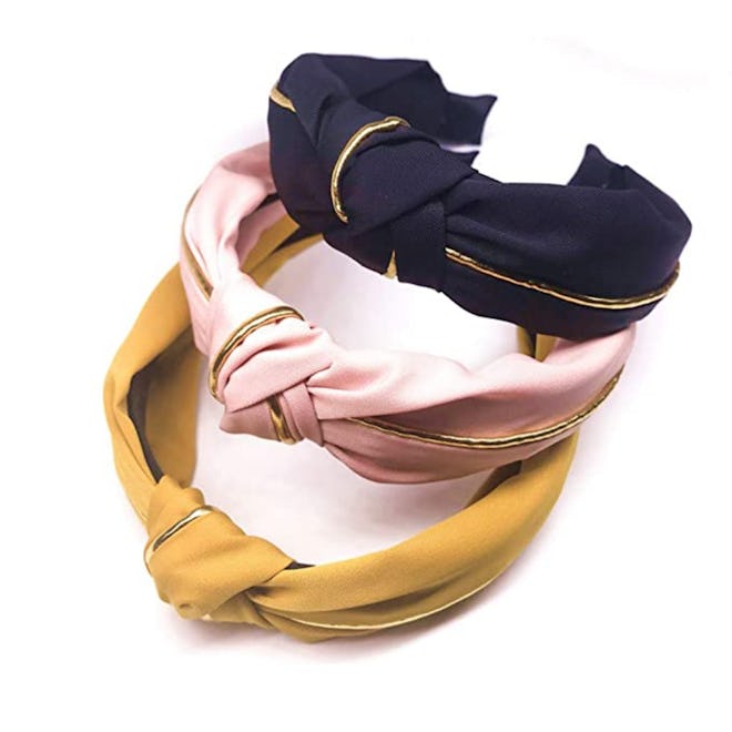 This pack of comfortable headbands features a stylish knot at the top and boast a super flexible des...