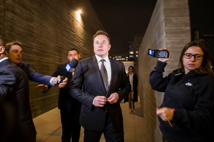 Elon Musk leaving court through the back door