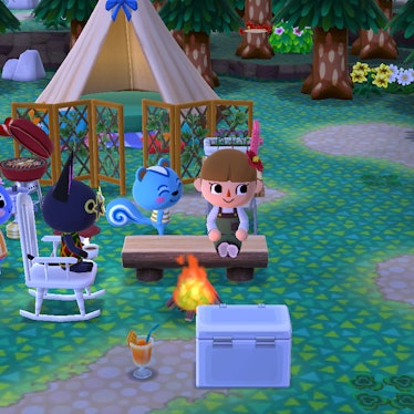 A screenshot of 'Animal Crossing: Pocket Camp' shows a brown-haired girl and two animals sitting nex...