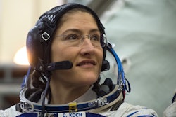 Astronaut Christina H. Koch in her uniform looking into the distance