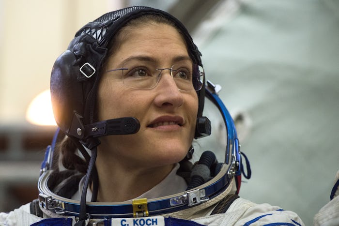 Astronaut Christina H. Koch in her uniform looking into the distance