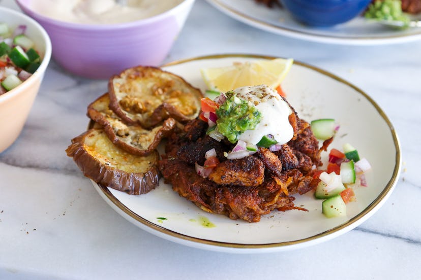 Chicken and potato latkes with creamy topping. 