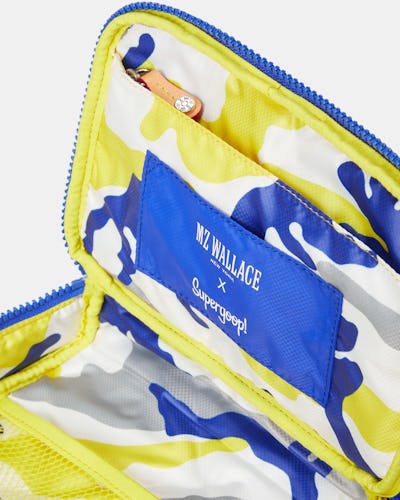 Supergoop!'s collab with MZ Wallace features a new blue and yellow makeup bag.