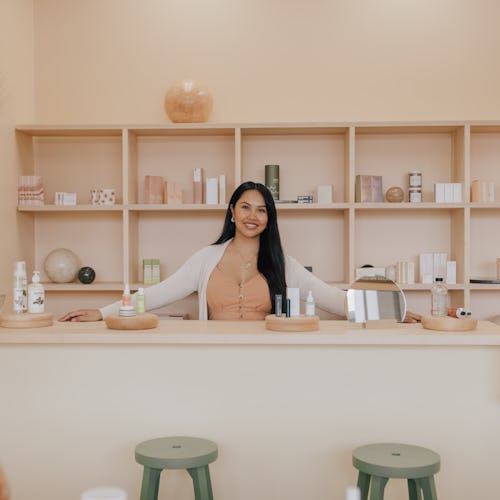 A woman inside The Things We Do, an L.A. beauty Bar with Filipina aesthetics