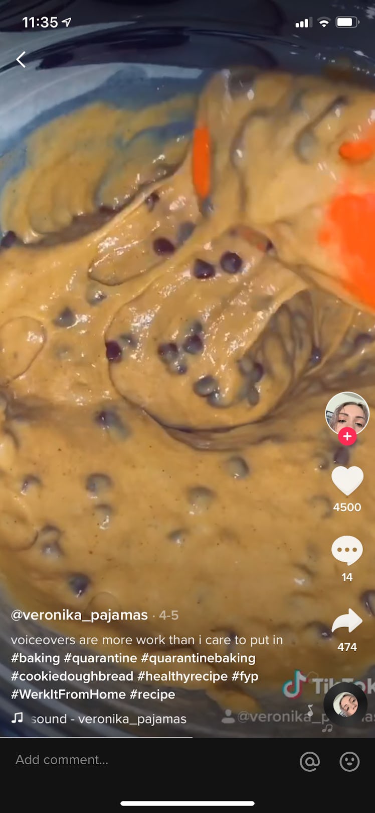 A bowl of cookie dough bread batter sits on a table and is mixed with a spatula in a TikTok video.