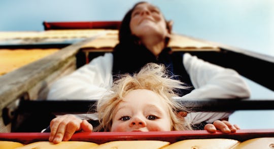 mother and child in playhouse