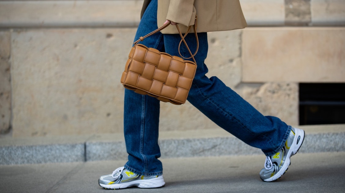 How To Wear Dad Sneakers In 2020, According To Styling Experts